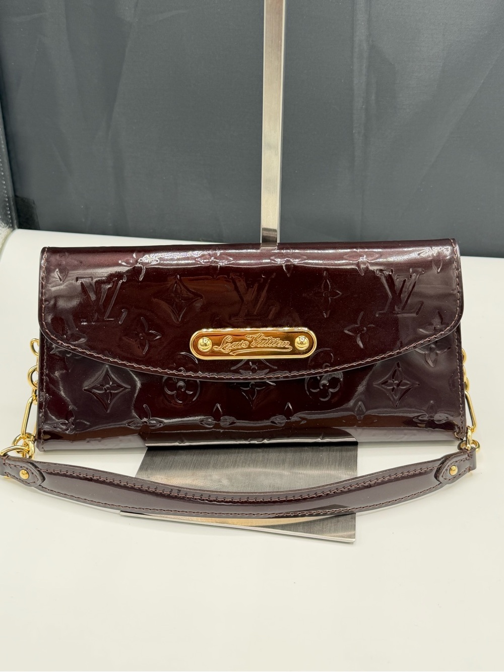 Louis Vuitton Sunset Boulevard Clutch in Amarante Monogram Vernis Patent Leather
